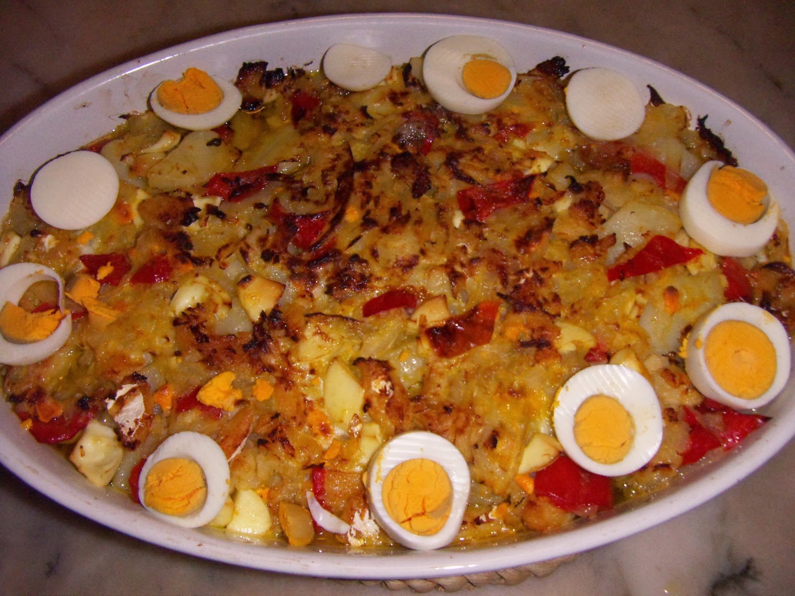 Bacalhau no forno com pimentos vermelhos